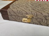 9053 Winchester Diamond Grade hard trunk style case. VERY rare as it will hold up to
34” barrel. Not many in this size. Has the original keys as well - 5 of 18