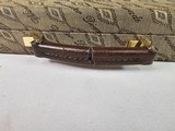 9053 Winchester Diamond Grade hard trunk style case. VERY rare as it will hold up to
34” barrel. Not many in this size. Has the original keys as well - 4 of 18