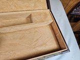 9053 Winchester Diamond Grade hard trunk style case. VERY rare as it will hold up to
34” barrel. Not many in this size. Has the original keys as well - 12 of 18