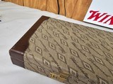 9053 Winchester Diamond Grade hard trunk style case. VERY rare as it will hold up to
34” barrel. Not many in this size. Has the original keys as well - 6 of 18