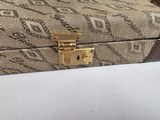 9053 Winchester Diamond Grade hard trunk style case. VERY rare as it will hold up to
34” barrel. Not many in this size. Has the original keys as well - 3 of 18