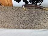 9053 Winchester Diamond Grade hard trunk style case. VERY rare as it will hold up to
34” barrel. Not many in this size. Has the original keys as well - 10 of 18