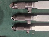 9056 Yugoslavian SKS blade bayonet, New. There are three in this lot, they have a 11” blade and lug for the rifle mount. More pictures at dawsonsdoubl - 6 of 14