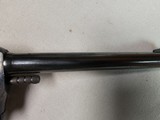 9054 H+R Arms Model 922 22 Caliber Long Rifle, Blued, 9 round, plastic checkered grips, 6” barre;, Leather custom holster. More pictures at dawsonsdou - 7 of 21