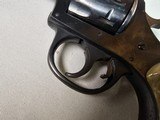 9054 H+R Arms Model 922 22 Caliber Long Rifle, Blued, 9 round, plastic checkered grips, 6” barre;, Leather custom holster. More pictures at dawsonsdou - 10 of 21