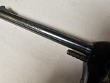 9054 H+R Arms Model 922 22 Caliber Long Rifle, Blued, 9 round, plastic checkered grips, 6” barre;, Leather custom holster. More pictures at dawsonsdou - 13 of 21