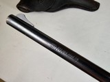 9054 H+R Arms Model 922 22 Caliber Long Rifle, Blued, 9 round, plastic checkered grips, 6” barre;, Leather custom holster. More pictures at dawsonsdou - 15 of 21