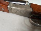 9059
Winchester Model 23 Pigeon XTR 12 Gauge, 3”, It has screw in chokes and comes with 7 Briley Chokes tubes. Round Knob, Ejectors, Vent Rib, 28” ba - 5 of 23
