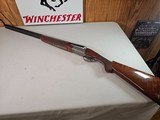 9059
Winchester Model 23 Pigeon XTR 12 Gauge, 3”, It has screw in chokes and comes with 7 Briley Chokes tubes. Round Knob, Ejectors, Vent Rib, 28” ba