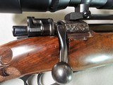 9063
Neumann Liege Belgium, 7x57, Mannlicher stock with check piece, heavy German engraving, engraved buffalo on floor plate, Flor des lies, ebony fr - 25 of 25