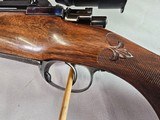 9063
Neumann Liege Belgium, 7x57, Mannlicher stock with check piece, heavy German engraving, engraved buffalo on floor plate, Flor des lies, ebony fr - 6 of 25
