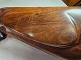 9063
Neumann Liege Belgium, 7x57, Mannlicher stock with check piece, heavy German engraving, engraved buffalo on floor plate, Flor des lies, ebony fr - 4 of 25