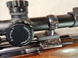 9063
Neumann Liege Belgium, 7x57, Mannlicher stock with check piece, heavy German engraving, engraved buffalo on floor plate, Flor des lies, ebony fr - 24 of 25