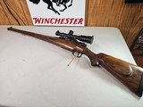 9063
Neumann Liege Belgium, 7x57, Mannlicher stock with check piece, heavy German engraving, engraved buffalo on floor plate, Flor des lies, ebony fr - 1 of 25