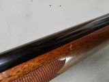 9063
Neumann Liege Belgium, 7x57, Mannlicher stock with check piece, heavy German engraving, engraved buffalo on floor plate, Flor des lies, ebony fr - 20 of 25