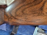 9065
Beretta 692, 12 gauge, 30” barrels, 6 chokes (2 Skeet, IC, M, IM, LM, CL) cleaning rod, 2 snap caps, Beretta ASE AAA fancy walnut, vent rib, but - 13 of 25