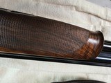 9065
Beretta 692, 12 gauge, 30” barrels, 6 chokes (2 Skeet, IC, M, IM, LM, CL) cleaning rod, 2 snap caps, Beretta ASE AAA fancy walnut, vent rib, but - 16 of 25