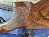 9065
Beretta 692, 12 gauge, 30” barrels, 6 chokes (2 Skeet, IC, M, IM, LM, CL) cleaning rod, 2 snap caps, Beretta ASE AAA fancy walnut, vent rib, but - 12 of 25