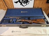 9065
Beretta 692, 12 gauge, 30” barrels, 6 chokes (2 Skeet, IC, M, IM, LM, CL) cleaning rod, 2 snap caps, Beretta ASE AAA fancy walnut, vent rib, but - 1 of 25