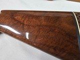 9067
Browning FN Superposed Diana Grade!!
SUPER RARE..
By R Kowalski Master Engraver, signed on BOTH Sides, Made in 1969, 2 3/4 chambers, 30” venti - 2 of 25