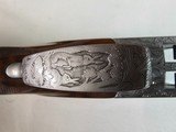 9067
Browning FN Superposed Diana Grade!!
SUPER RARE..
By R Kowalski Master Engraver, signed on BOTH Sides, Made in 1969, 2 3/4 chambers, 30” venti - 14 of 25