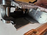 9067
Browning FN Superposed Diana Grade!!
SUPER RARE..
By R Kowalski Master Engraver, signed on BOTH Sides, Made in 1969, 2 3/4 chambers, 30” venti - 17 of 25