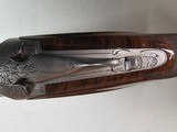 9067
Browning FN Superposed Diana Grade!!
SUPER RARE..
By R Kowalski Master Engraver, signed on BOTH Sides, Made in 1969, 2 3/4 chambers, 30” venti - 18 of 25