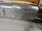 9069
A. V. Maurcini 12 Gauge 28” Mod/FULL, double triggers, ejectors, brass front bead, dogs and ducks, pheasants on receiver, butt plate, pistol gri - 11 of 25