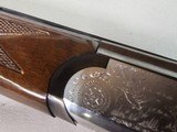 9069
A. V. Maurcini 12 Gauge 28” Mod/FULL, double triggers, ejectors, brass front bead, dogs and ducks, pheasants on receiver, butt plate, pistol gri - 14 of 25