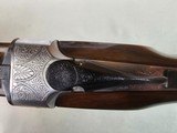 9069
A. V. Maurcini 12 Gauge 28” Mod/FULL, double triggers, ejectors, brass front bead, dogs and ducks, pheasants on receiver, butt plate, pistol gri - 19 of 25