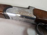 9069
A. V. Maurcini 12 Gauge 28” Mod/FULL, double triggers, ejectors, brass front bead, dogs and ducks, pheasants on receiver, butt plate, pistol gri - 8 of 25