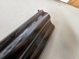 9069
A. V. Maurcini 12 Gauge 28” Mod/FULL, double triggers, ejectors, brass front bead, dogs and ducks, pheasants on receiver, butt plate, pistol gri - 20 of 25