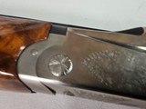 9081
SKB
505, 28 Gauge, 28 Barrels, SK/SK,
screw in chokes, Pigeon Grip with cap, 14 1/4 LOP,
SKB Butt pad, Crossbolt, vent rib, single selective - 11 of 25