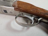 9081
SKB
505, 28 Gauge, 28 Barrels, SK/SK,
screw in chokes, Pigeon Grip with cap, 14 1/4 LOP,
SKB Butt pad, Crossbolt, vent rib, single selective - 8 of 25