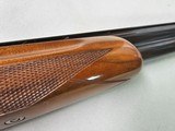 9081
SKB
505, 28 Gauge, 28 Barrels, SK/SK,
screw in chokes, Pigeon Grip with cap, 14 1/4 LOP,
SKB Butt pad, Crossbolt, vent rib, single selective - 22 of 25