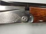 9081
SKB
505, 28 Gauge, 28 Barrels, SK/SK,
screw in chokes, Pigeon Grip with cap, 14 1/4 LOP,
SKB Butt pad, Crossbolt, vent rib, single selective - 25 of 25