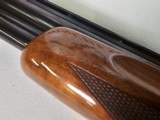 9081
SKB
505, 28 Gauge, 28 Barrels, SK/SK,
screw in chokes, Pigeon Grip with cap, 14 1/4 LOP,
SKB Butt pad, Crossbolt, vent rib, single selective - 14 of 25