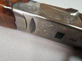 9081
SKB
505, 28 Gauge, 28 Barrels, SK/SK,
screw in chokes, Pigeon Grip with cap, 14 1/4 LOP,
SKB Butt pad, Crossbolt, vent rib, single selective - 10 of 25