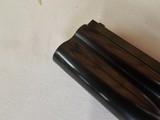 9081
SKB
505, 28 Gauge, 28 Barrels, SK/SK,
screw in chokes, Pigeon Grip with cap, 14 1/4 LOP,
SKB Butt pad, Crossbolt, vent rib, single selective - 16 of 25