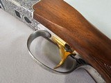 9080
SKB 600, 410 Gauge, 28” Barrels, IC/IC, extensive heavy engraving, gold trigger, pigeon grip with cap, 14 1/4 LOP, factory pad, extractors, cros - 7 of 25