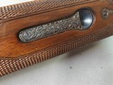 9080
SKB 600, 410 Gauge, 28” Barrels, IC/IC, extensive heavy engraving, gold trigger, pigeon grip with cap, 14 1/4 LOP, factory pad, extractors, cros - 24 of 25