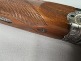 9080
SKB 600, 410 Gauge, 28” Barrels, IC/IC, extensive heavy engraving, gold trigger, pigeon grip with cap, 14 1/4 LOP, factory pad, extractors, cros - 11 of 25