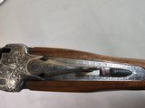 9080
SKB 600, 410 Gauge, 28” Barrels, IC/IC, extensive heavy engraving, gold trigger, pigeon grip with cap, 14 1/4 LOP, factory pad, extractors, cros - 18 of 25