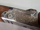 9080
SKB 600, 410 Gauge, 28” Barrels, IC/IC, extensive heavy engraving, gold trigger, pigeon grip with cap, 14 1/4 LOP, factory pad, extractors, cros - 10 of 25