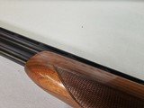 9080
SKB 600, 410 Gauge, 28” Barrels, IC/IC, extensive heavy engraving, gold trigger, pigeon grip with cap, 14 1/4 LOP, factory pad, extractors, cros - 13 of 25