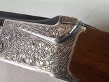 9080
SKB 600, 410 Gauge, 28” Barrels, IC/IC, extensive heavy engraving, gold trigger, pigeon grip with cap, 14 1/4 LOP, factory pad, extractors, cros - 16 of 25