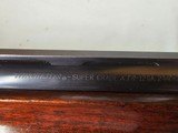 9082
Winchester 101 Super grade XTR, (Pigeon) 12 Gauge, M/F 28” Barrels, Round Knob, 14 1/2 LOP, butt pad, vent rib,
AA++, fancy tiger striped feath - 18 of 25