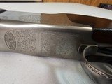 9082
Winchester 101 Super grade XTR, (Pigeon) 12 Gauge, M/F 28” Barrels, Round Knob, 14 1/2 LOP, butt pad, vent rib,
AA++, fancy tiger striped feath - 15 of 25