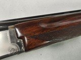 9082
Winchester 101 Super grade XTR, (Pigeon) 12 Gauge, M/F 28” Barrels, Round Knob, 14 1/2 LOP, butt pad, vent rib,
AA++, fancy tiger striped feath - 24 of 25