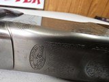 9082
Winchester 101 Super grade XTR, (Pigeon) 12 Gauge, M/F 28” Barrels, Round Knob, 14 1/2 LOP, butt pad, vent rib,
AA++, fancy tiger striped feath - 16 of 25